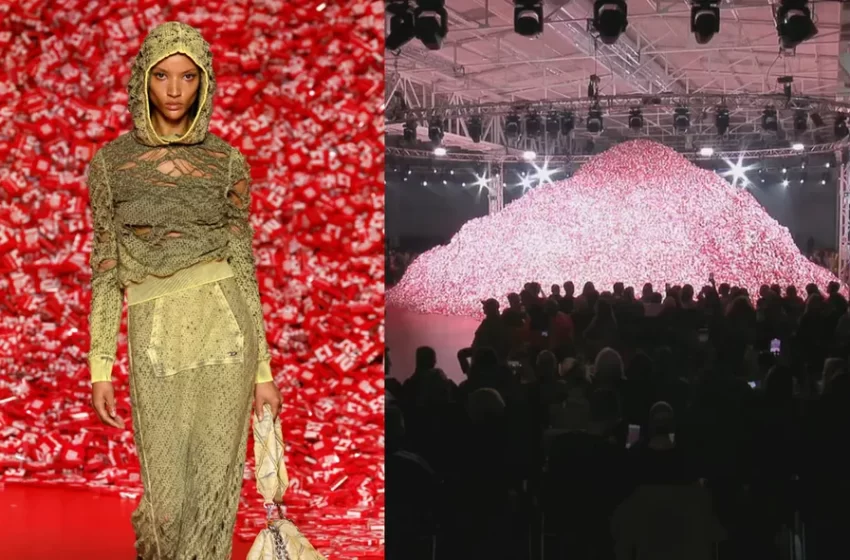  Grife chama atenção com montanha de camisinhas como cenário para desfile