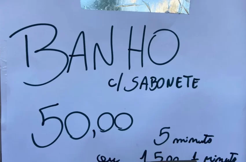  Banho a R$ 50 e guarda-chuva “reciclado”: Comércio no entorno do Engenhão lucra com calor